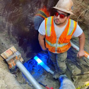 Damaged pipe being repaired via trenchless pipe lining Seattle, WA