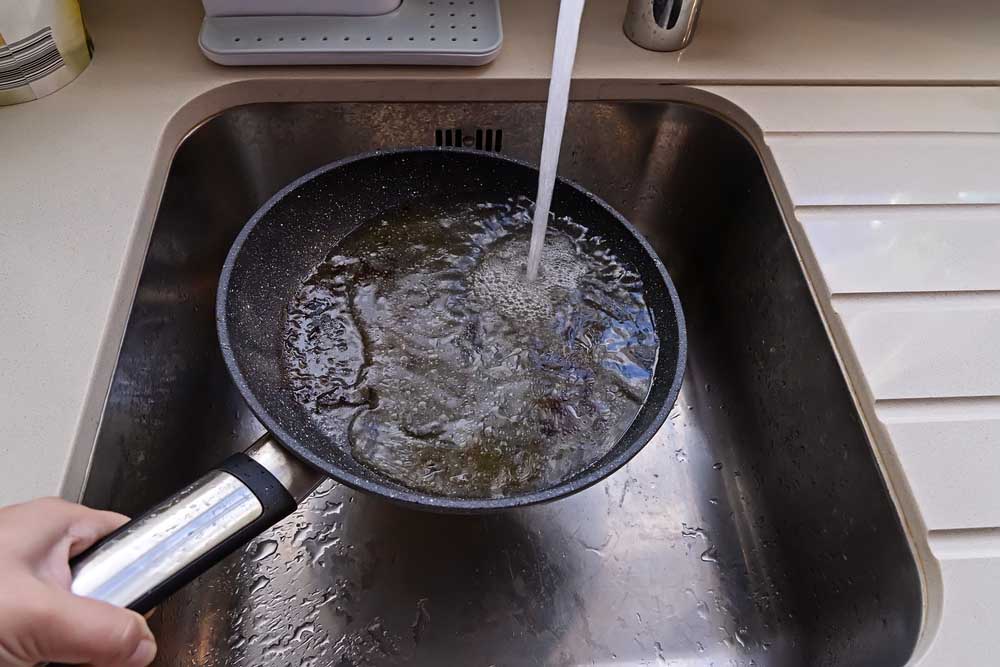 pouring grease down the kitchen drain Everett, WA