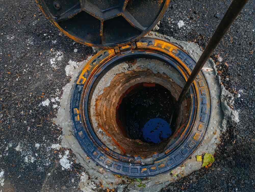 open sewer manhole inspection access